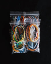 Six packages with assorted Bible Memory Project wristbands